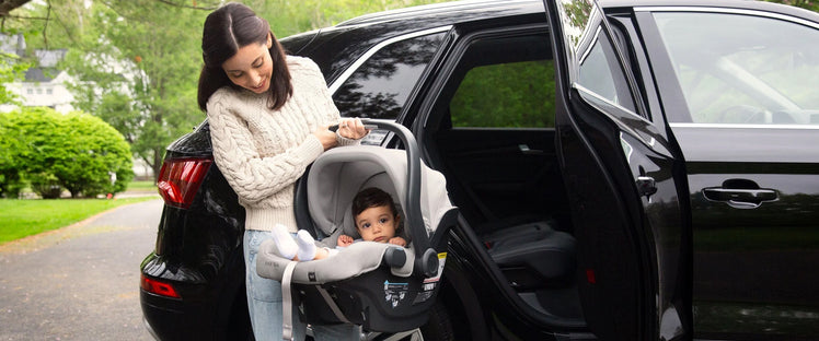 Mom Unloading Baby in Infant Car Seat
