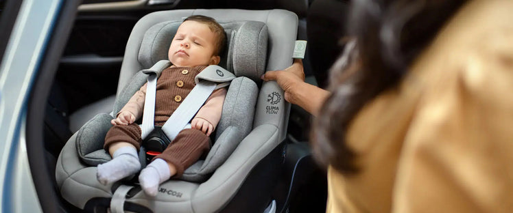 Baby Sleeping in Infant Car Seat in Car