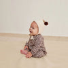 cute baby wearing quincy mae baby pixie bonnet