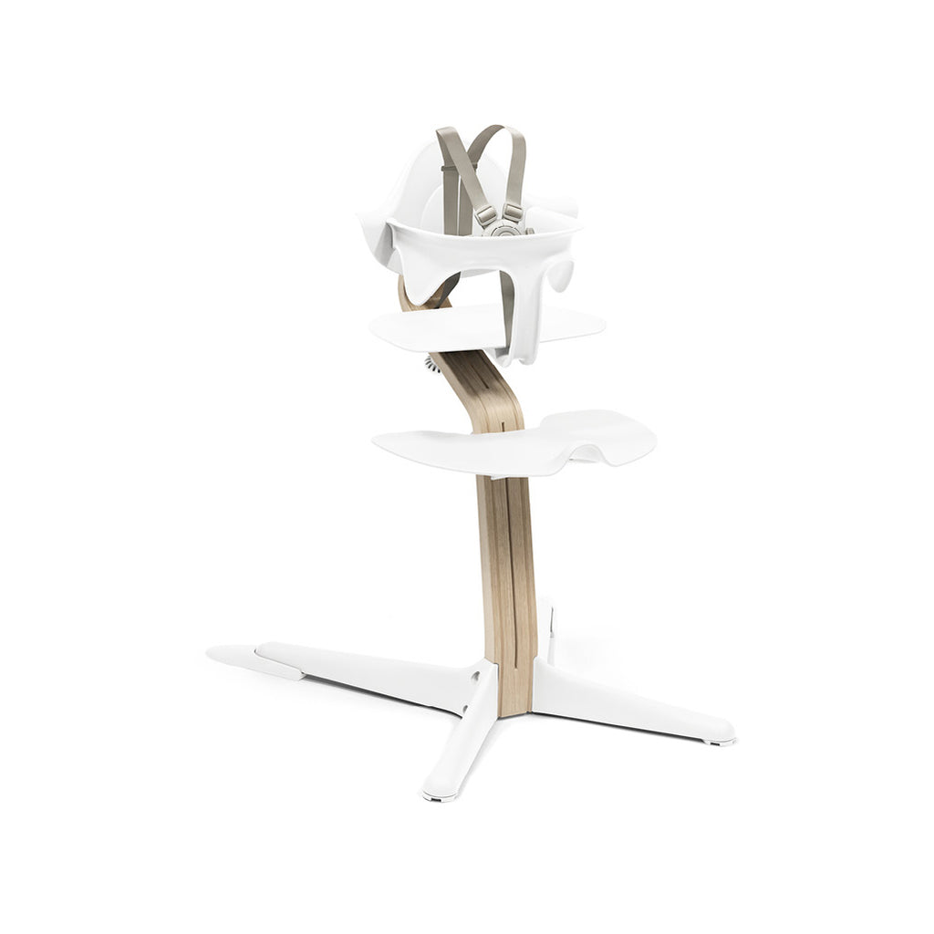 White natural stokke Nomi wooden high chairs