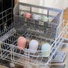 Assorted mini cups in the dishwasher