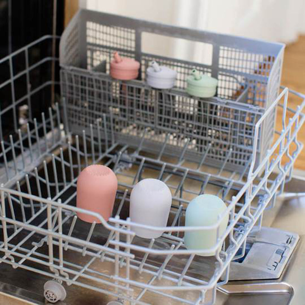 Assorted mini cups in the dishwasher
