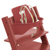 Stokke Tripp Trapp wooden high chairs in warm red