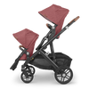 Side of Lucy Red Uppababy VISTA V2 Stroller with Two Rumbleseats