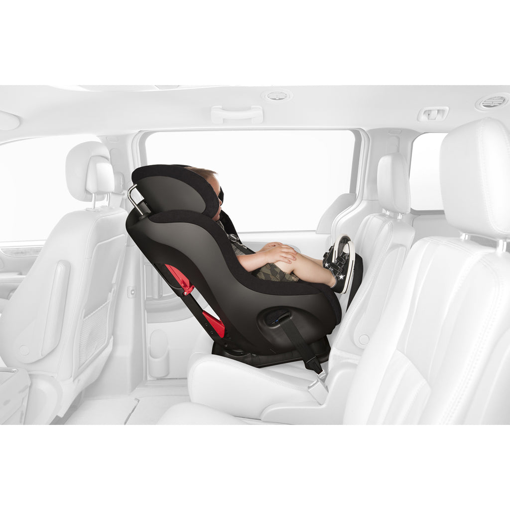Child in the Clek Fllo best convertible car seat for small cars