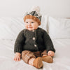 Huggalugs Loden Garter Stitch Cardigan Sweater modeled on infant.