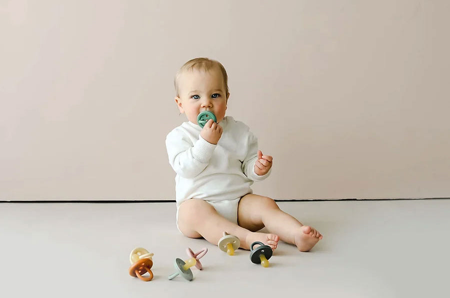 Happy Baby with Pacifiers