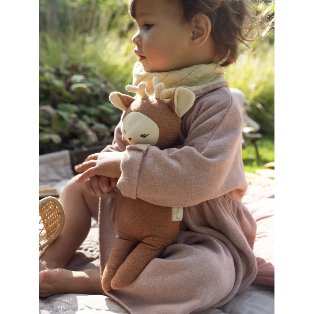 Child Holding Fabelab Buddy Fiona Stuffed Fawn