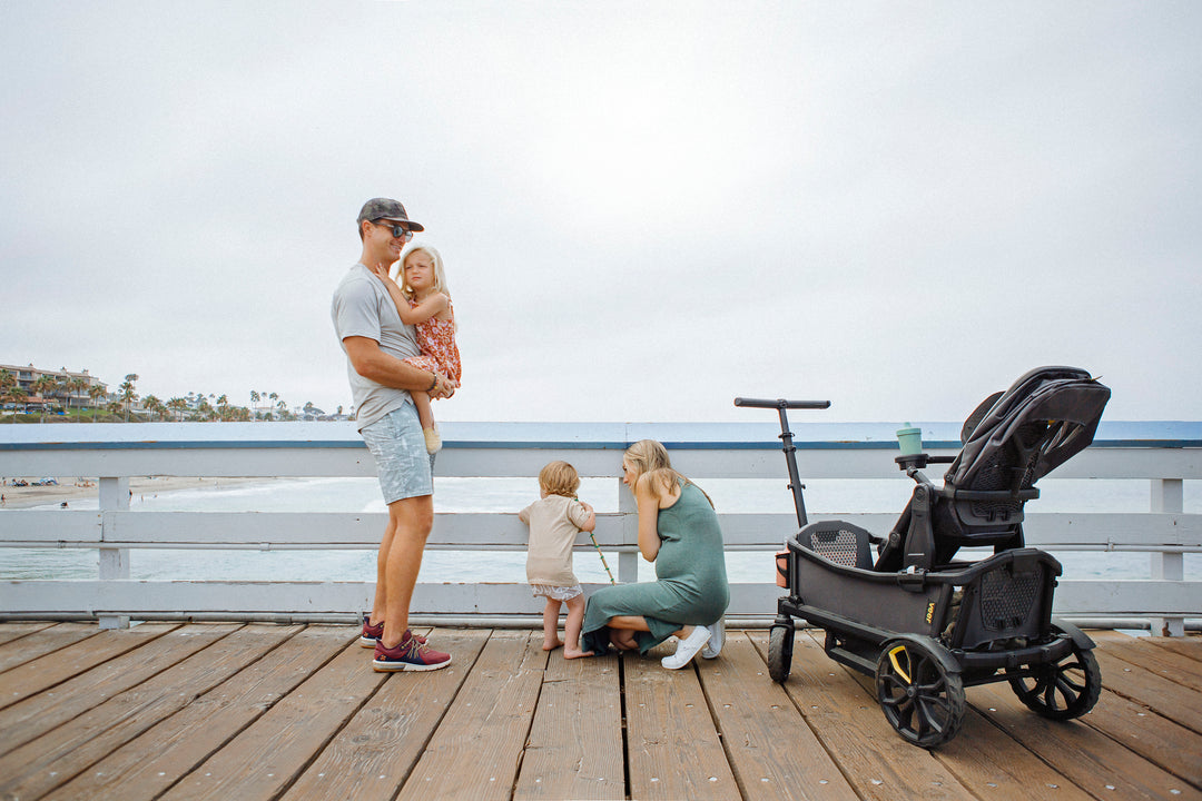 Happy Family near beach with Veer Cruiser Stroller Wagon