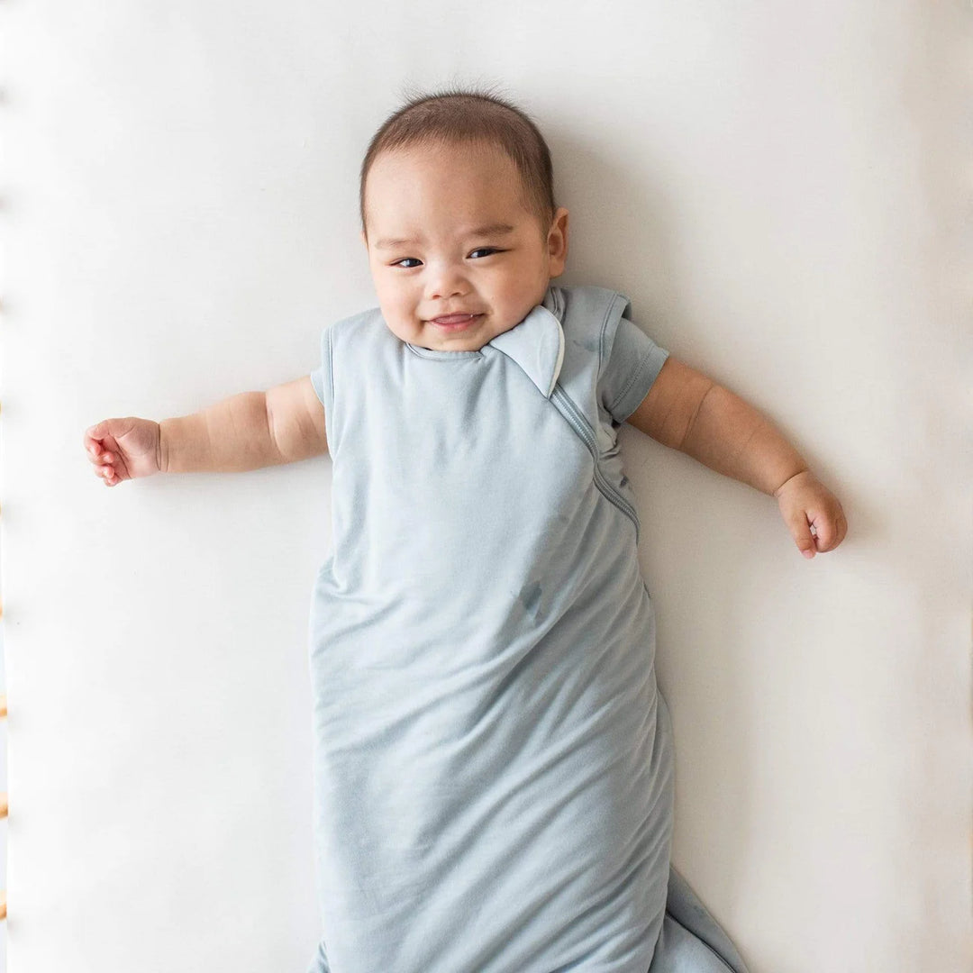 Happy Baby in Kyte Baby Sleep Sack