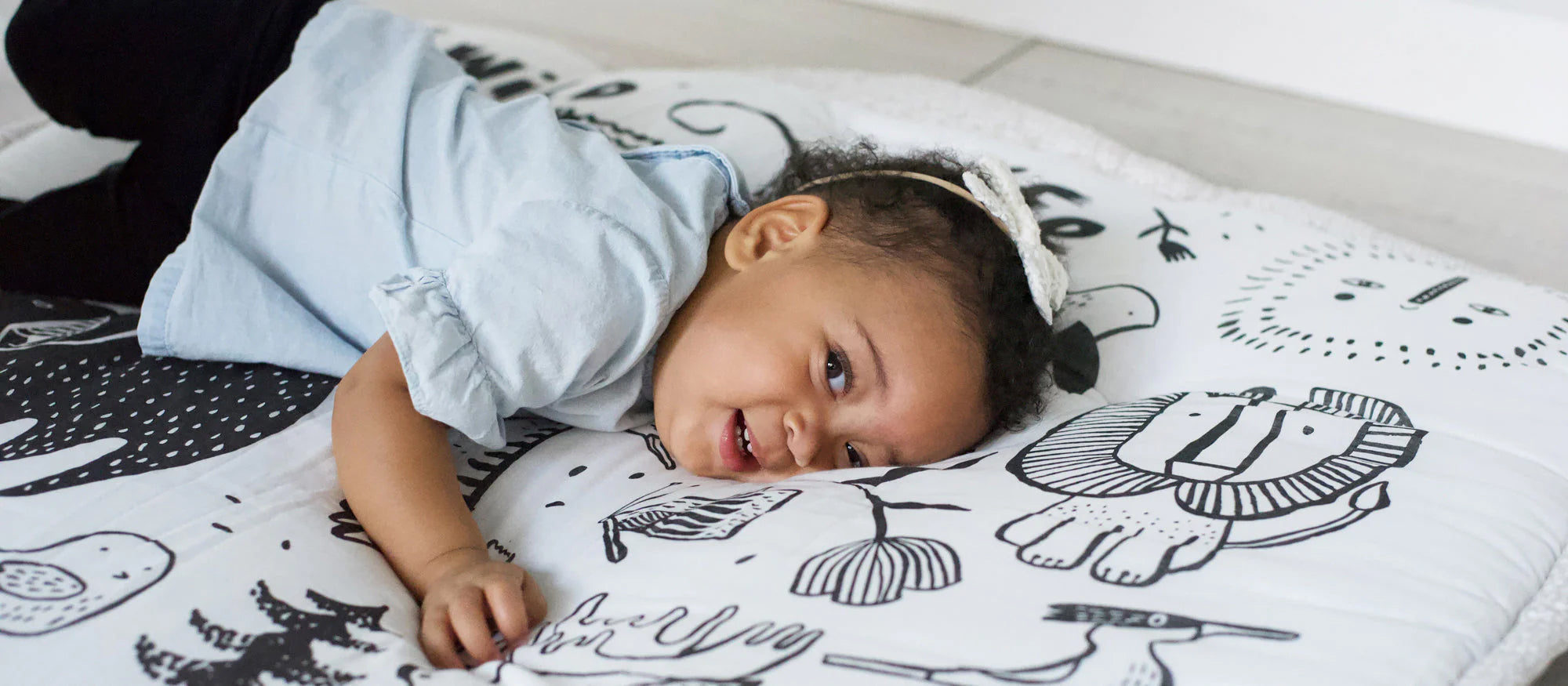 Toddler Plays on Wee Gallery Blanket