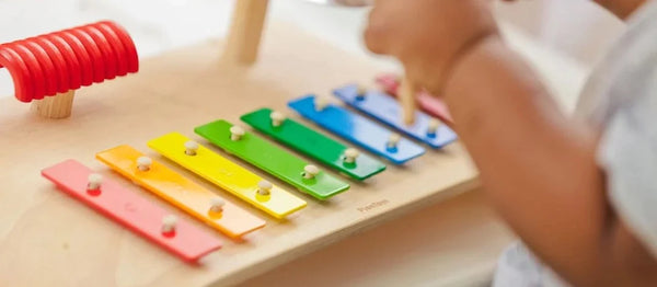 Baby Playing Colorful Melody Xylophone