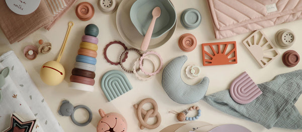 Overhead View of Collection of Mushie Toys, Blankets, and Tableware