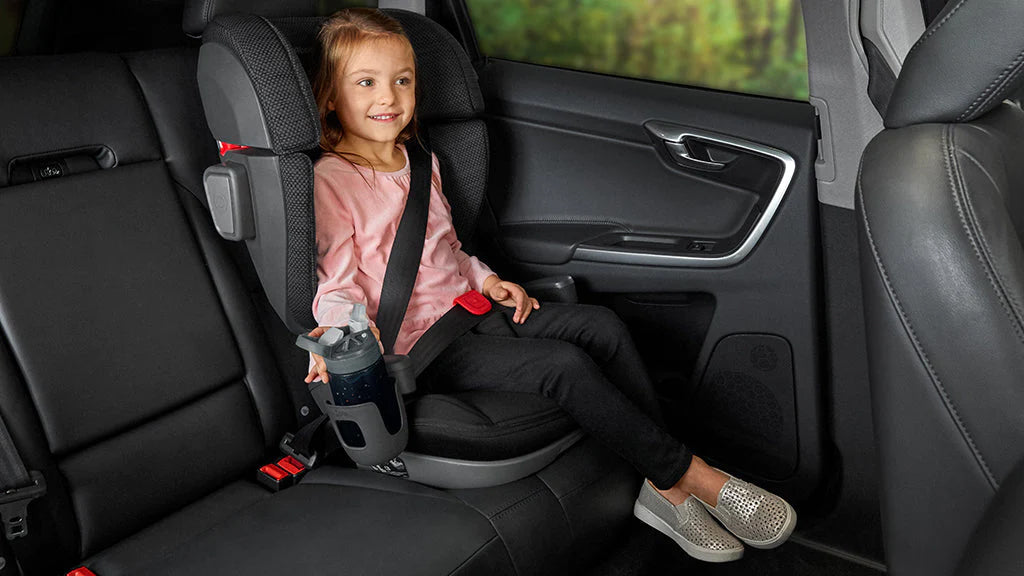 Preschooler riding in UPPAbaby ALTA high-back booster seat