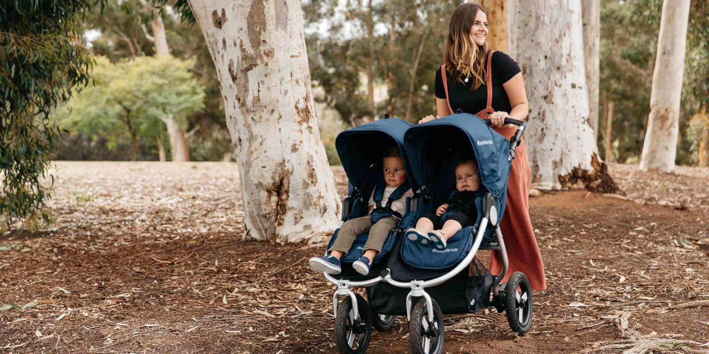 Woman Pushing Kids in Bumbleride Double Stroller