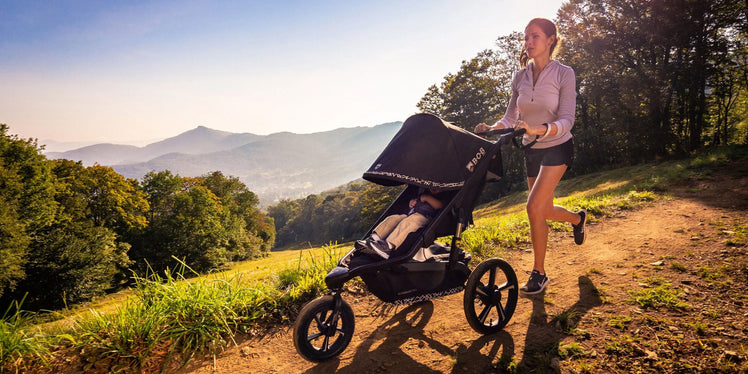 Woman Running with Child in BOB Jogging Stroller