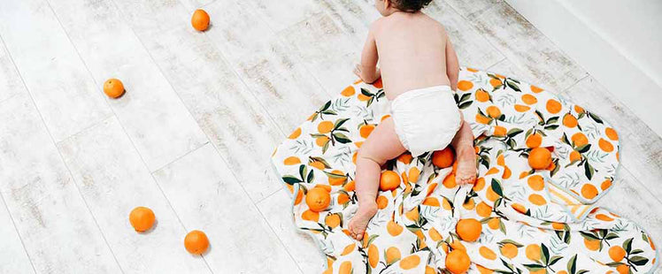 Baby Crawling on Clementine Blanket