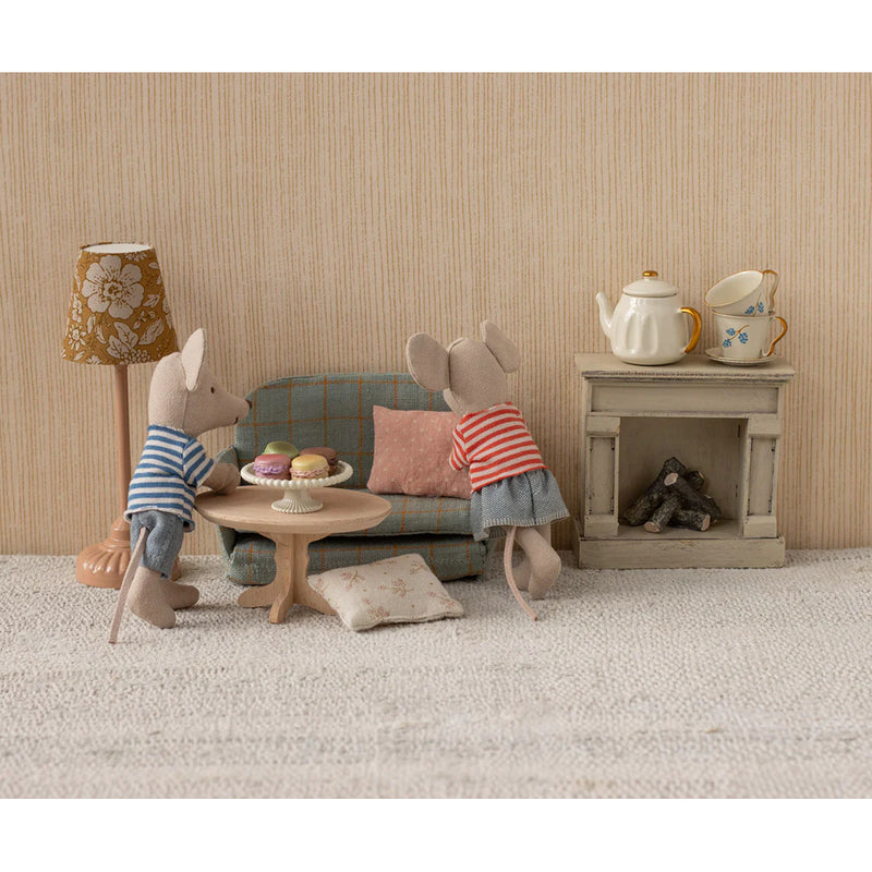 Designed for tiny interiors, the Maileg Mouse Oval Coffee Table enhances dollhouse furniture displays.