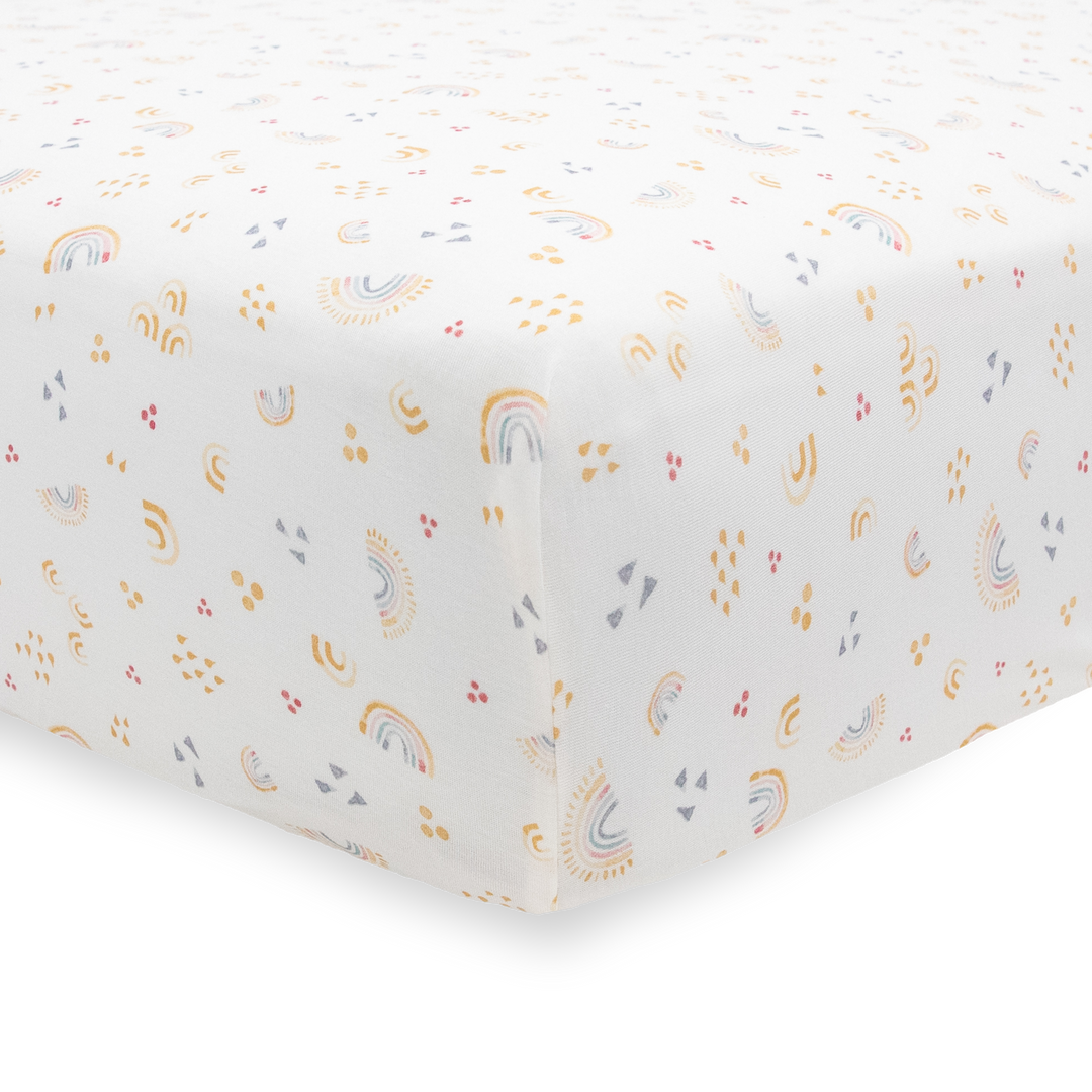 Colorful Rainbows crib sheet by Little Unicorn, fitted crib sheet designed for comfort and durability in any nursery.