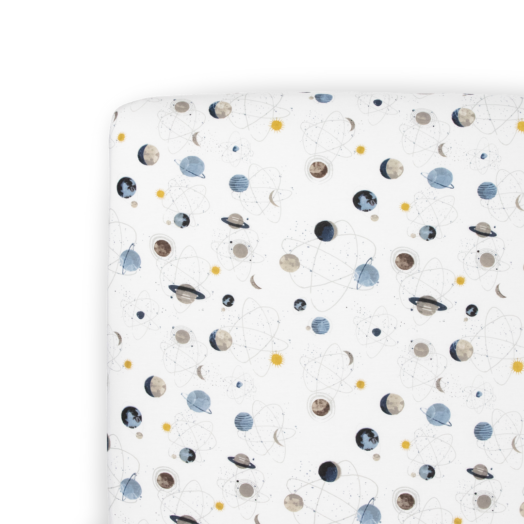 Little Unicorn Planets Stretch Knit Crib Sheet, cozy baby crib sheets featuring a fun space-themed pattern.