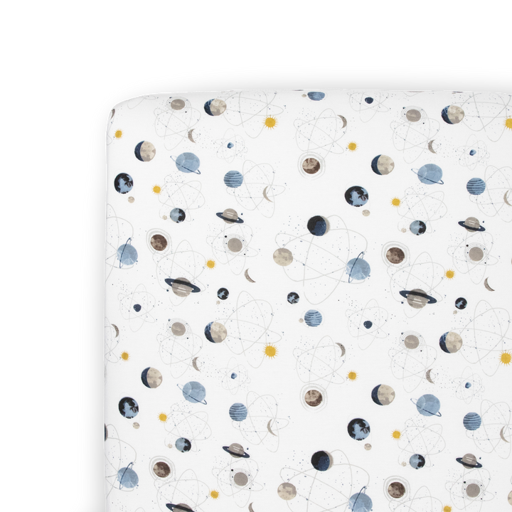 Little Unicorn Planets Stretch Knit Crib Sheet, cozy baby crib sheets featuring a fun space-themed pattern.