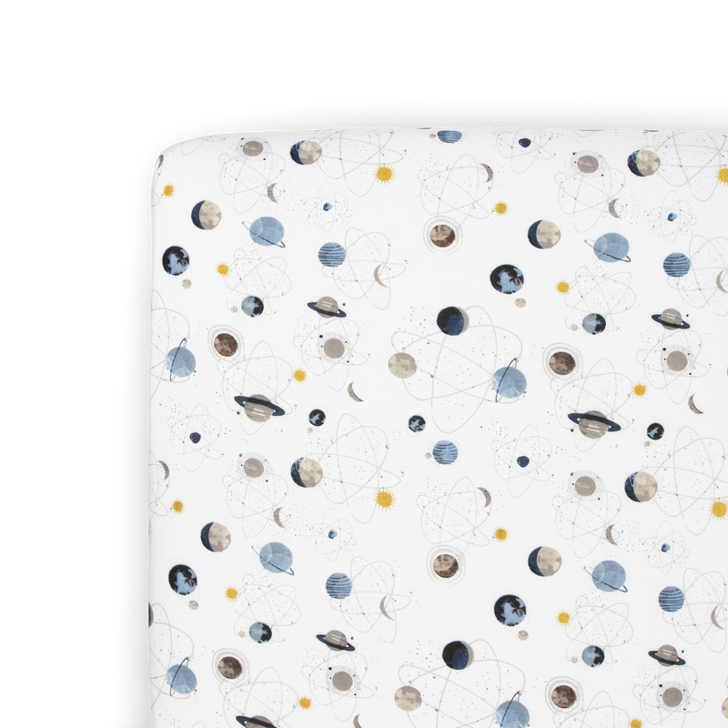 Little Unicorn Planets Stretch Knit Crib Sheet, cozy baby crib sheets featuring a fun space-themed pattern.