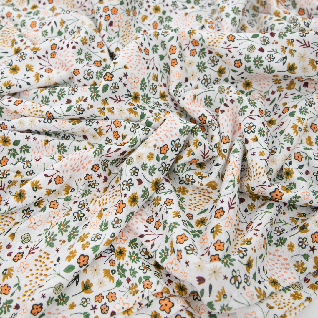 Wrap your baby in comfort with Little Unicorn Pressed Petals Muslin Swaddle, perfect muslin blankets.