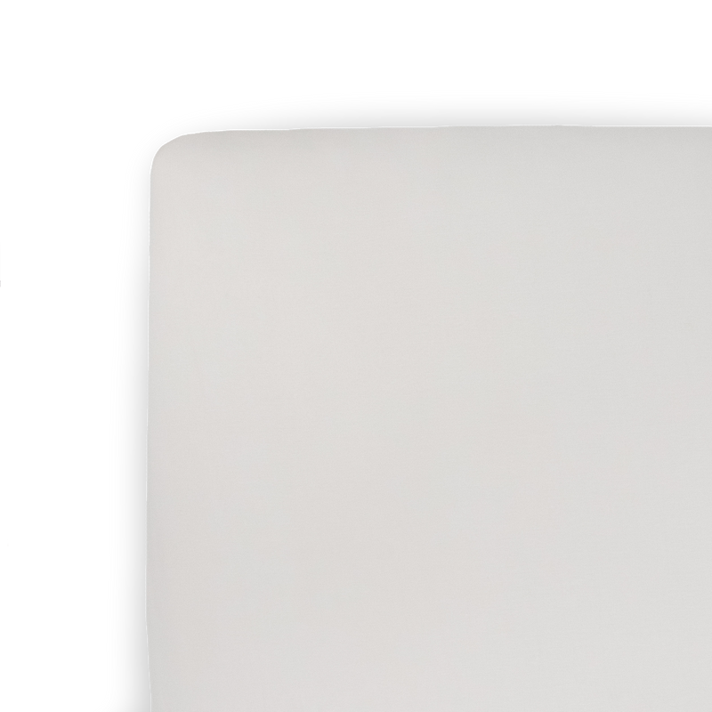 Little Unicorn Stretch Knit Crib Sheet - Pebble on crib mattress, soft fitted crib sheet for baby comfort and nursery style