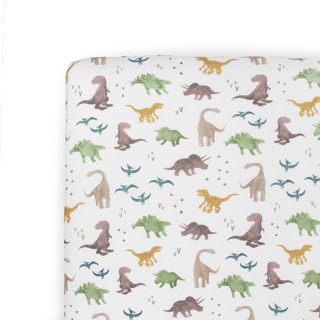 Soft and playful Little Unicorn Stretch Knit Crib Sheet - Dino Pals, perfect crib sheets for boys or girls