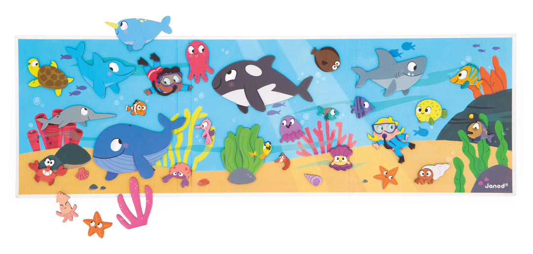 Kids magnet toys ocean scene by Janod with crab, orca, and fish arranged underwater