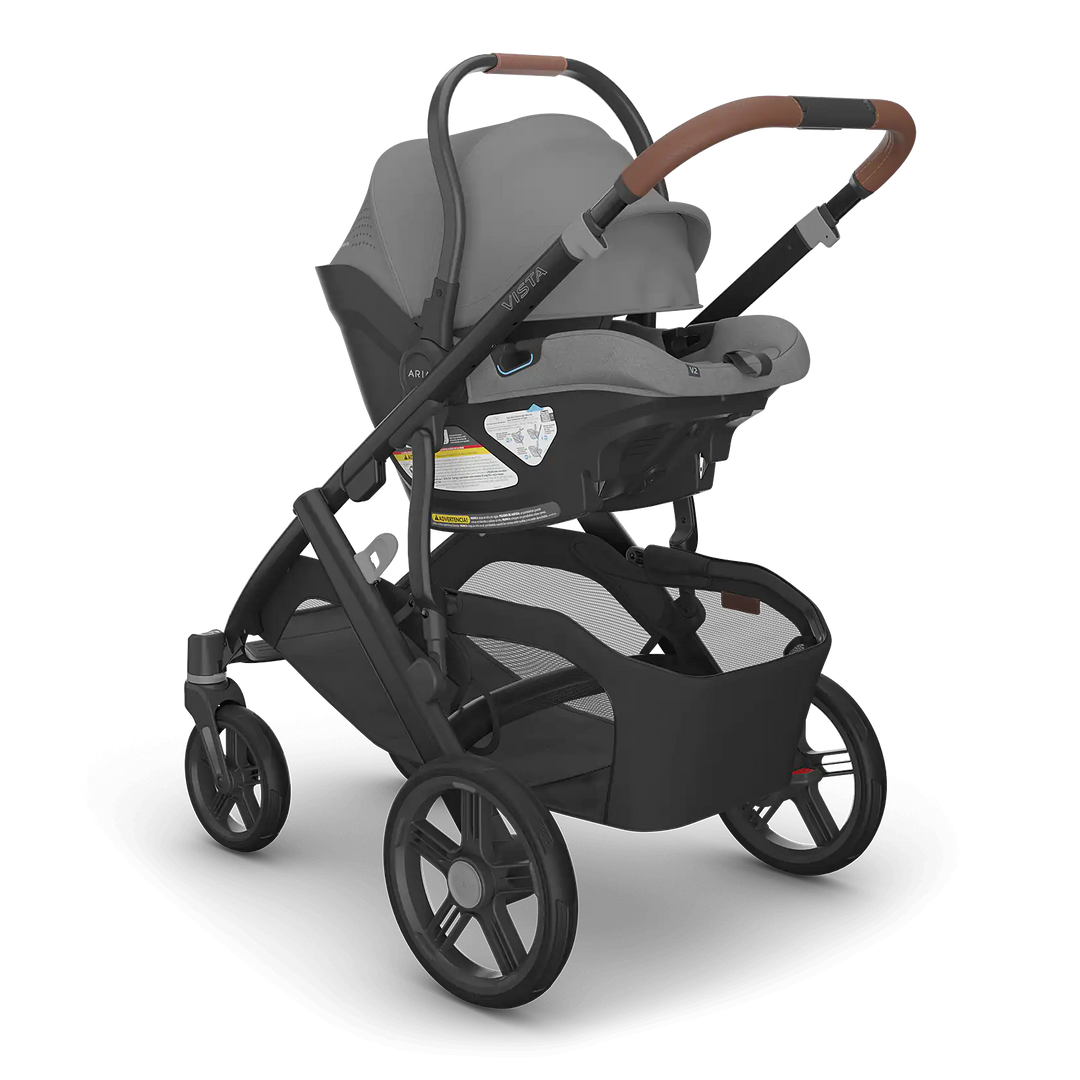 UPPAbaby Vista V3 Greyson with Aria V2 Greyson angle — full-size stroller and lightweight car seat bundle