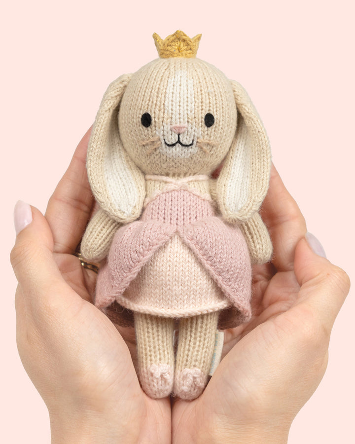 Cuddle and Kind tiny princess doll with crocheted crown and sparkle slippers