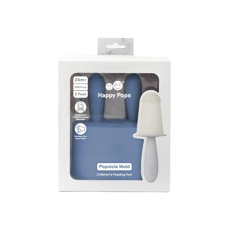 Frozen fruit slides easily into the Indigo EZPZ Happy Pops, flexible silicone baby feeder for messy-free fun