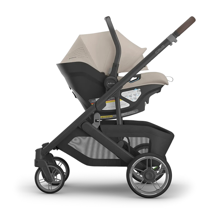 UPPAbaby Cruz V3 Ada with Aria V2 Ada side — best neutral sandstone compact stroller and car seat bundle