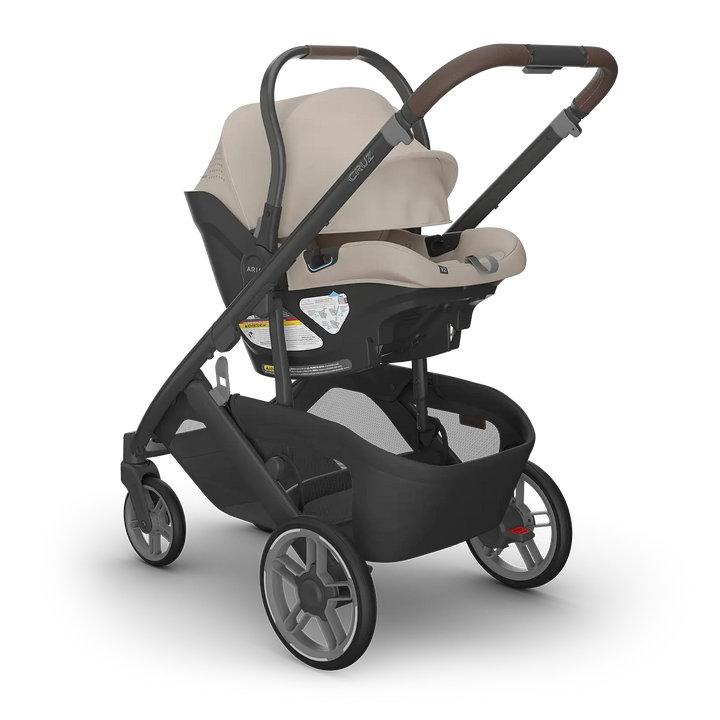 UPPAbaby Cruz V3 Ada with Aria V2 Ada angle — sandstone compact stroller travel system