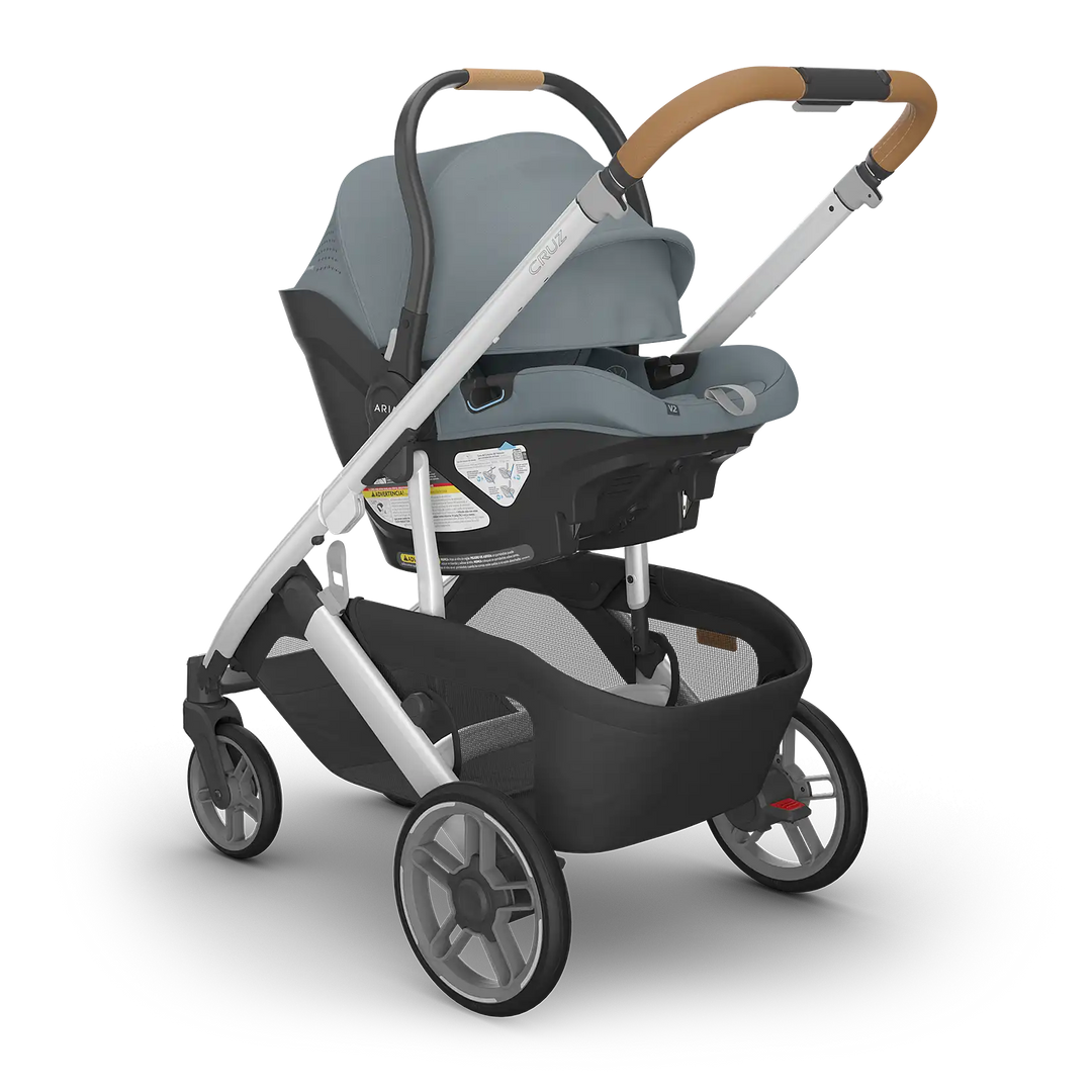 UPPAbaby Cruz V3 Callum with Aria V2 Callum angle — stone blue compact stroller and car seat bundle