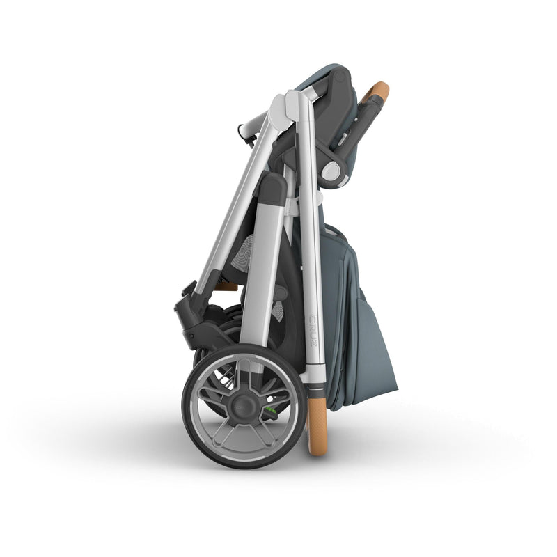 Compact folded Uppababy Cruz V3 Stroller Callum with one handed fold feature and easy transport capability