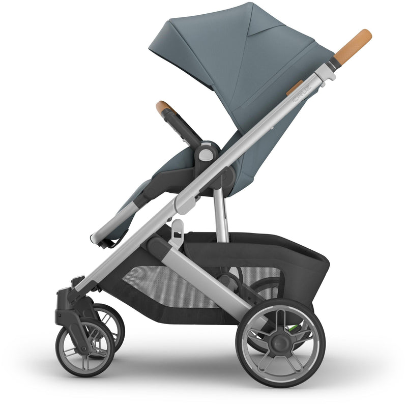 Full left side profile of uppa baby  Cruz V3 Stroller Callum, showcasing premium fabrics and compact fold design