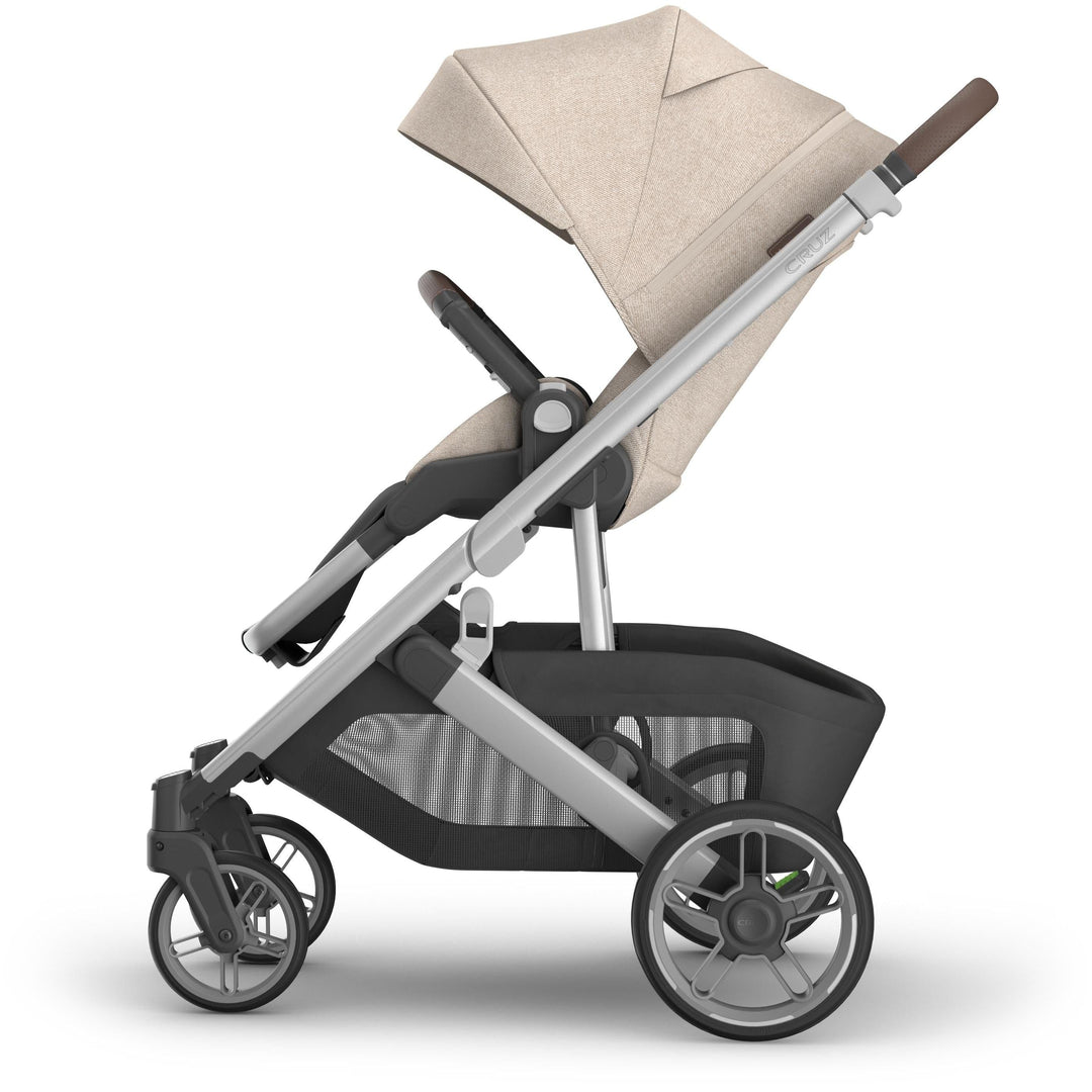 Full left side profile of uppababy Cruz V3 Stroller Declan, showcasing travel system stroller quality and compact fold
