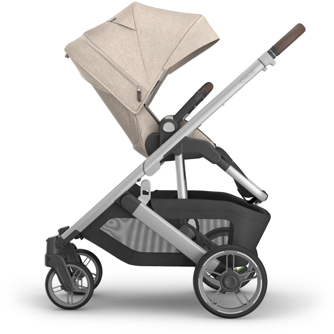 Reversed seat side view of Uppababy Cruz V3 Stroller Declan, a stroller with bassinet seat option for family versatility