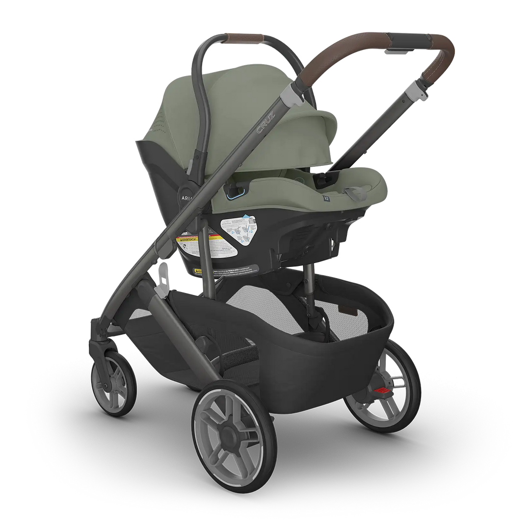 UPPAbaby Cruz V3 Evelyn with Aria V2 Evelyn angle — meadow green compact stroller travel system