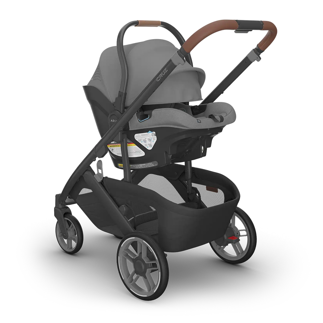 UPPAbaby Cruz V3 Greyson with Aria V2 Greyson angle — charcoal compact stroller travel system