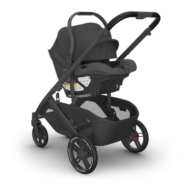 UPPAbaby Cruz V3 Jake with Aria V2 Jake angle — all-black compact stroller travel system