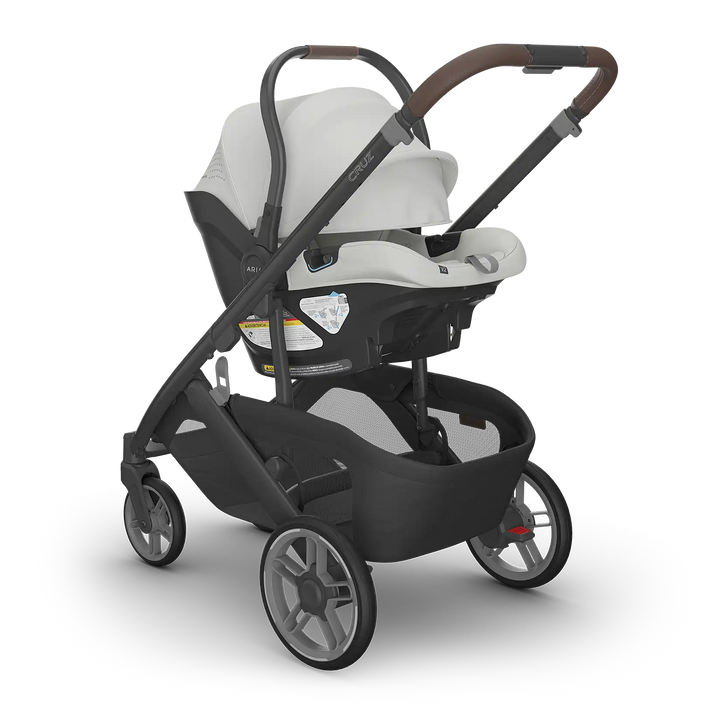 UPPAbaby Cruz V3 Savannah with Aria V2 Savannah angle — pearl gray compact stroller travel system