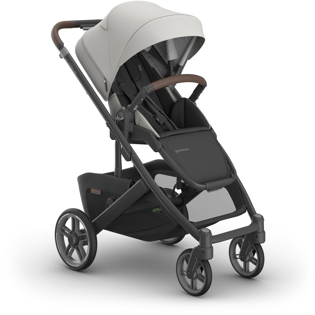 Right angle of uppa baby  Cruz V3 Stroller Savannah, showcasing lightweight stroller design and durable frame