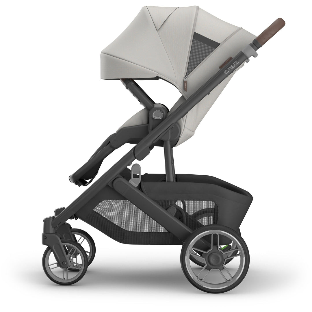 Left side sunshade extended on uppababy v3 stroller cruz Savannah, featuring UPF 50 canopy and smooth handling