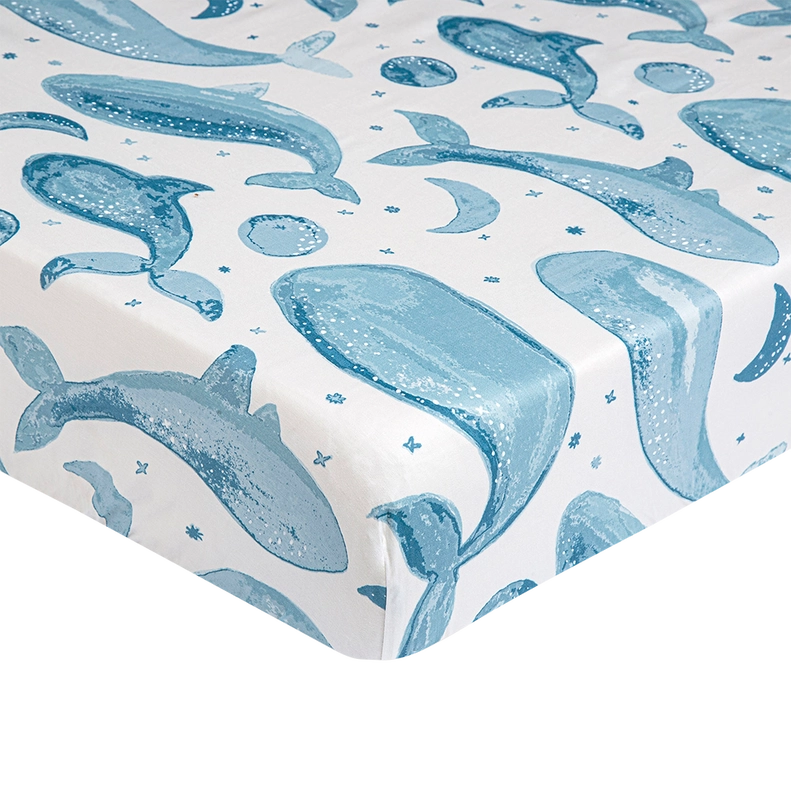 Caspian Crib Sheet in Whale by Crane Baby, featuring soft whale design, perfect for baby crib sheets.