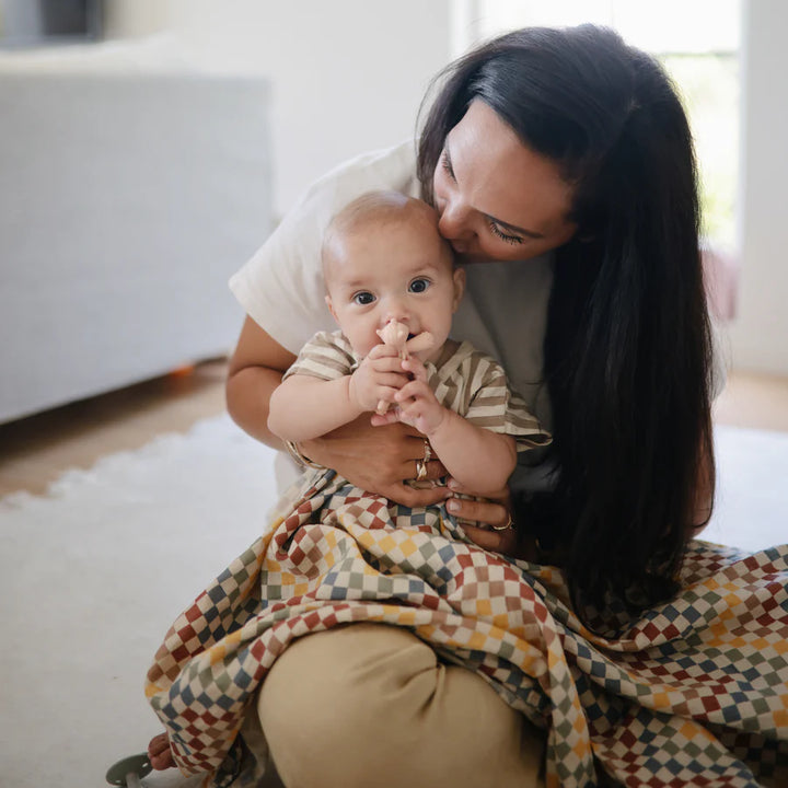 Mushie unicorn-shaped teething toy for baby discomfort relief