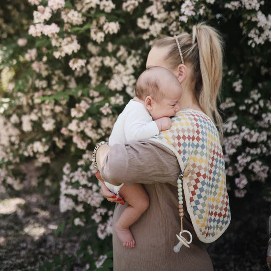 Mushie Retro Check burp cloth perfect for feeding time