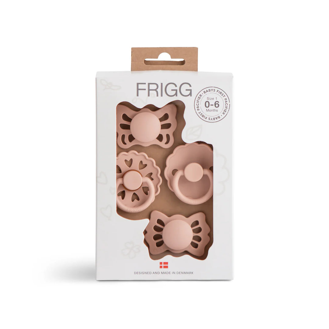 FRIGG Baby's First Floral Heart Blush pacifier set - four mixed-style newborn pacifiers in blush packaging